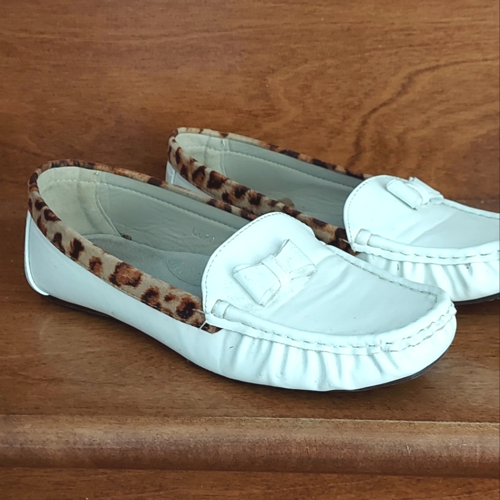 Women's White Loafers with Leopard Trim.